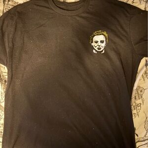 Black Short Sleeve Graphic Tee with Small Joker Portrait